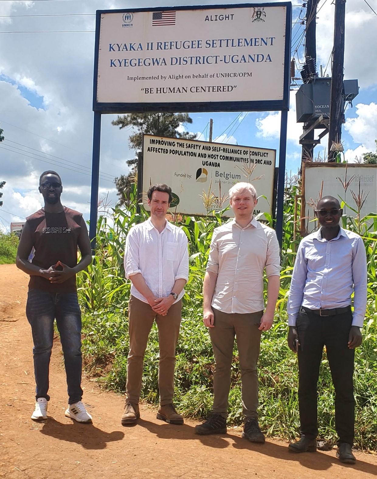 A brief pause after a long day in the field. I stand beside Professor Matthew, (his arms folded,) while Dr. Will shares the frame with Mutoto
