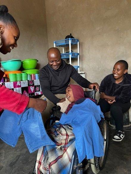 A home care visit brings company and support to a boy with cerebral palsy and his family.