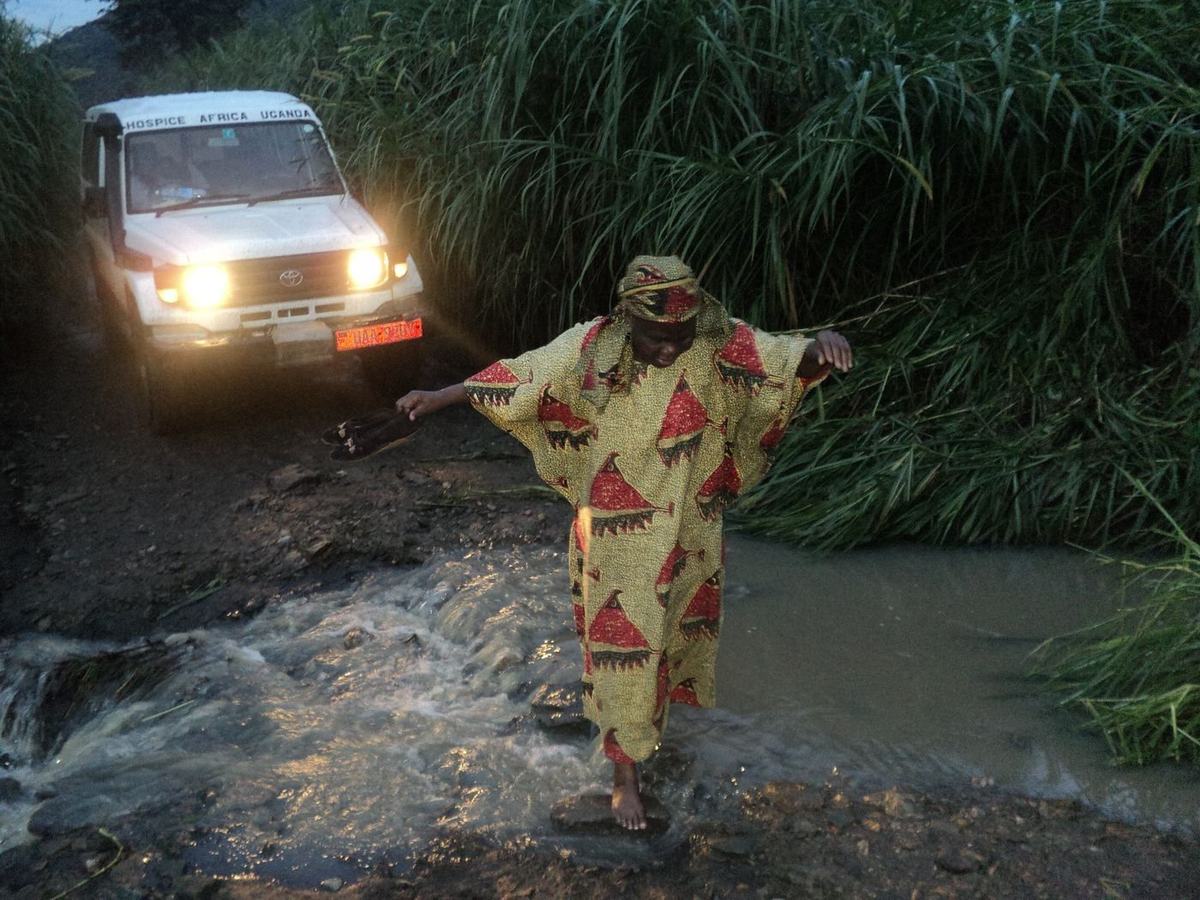 Rain-damaged roads challenge the team's journey to Bundibugyo during a field visit in October 2011.