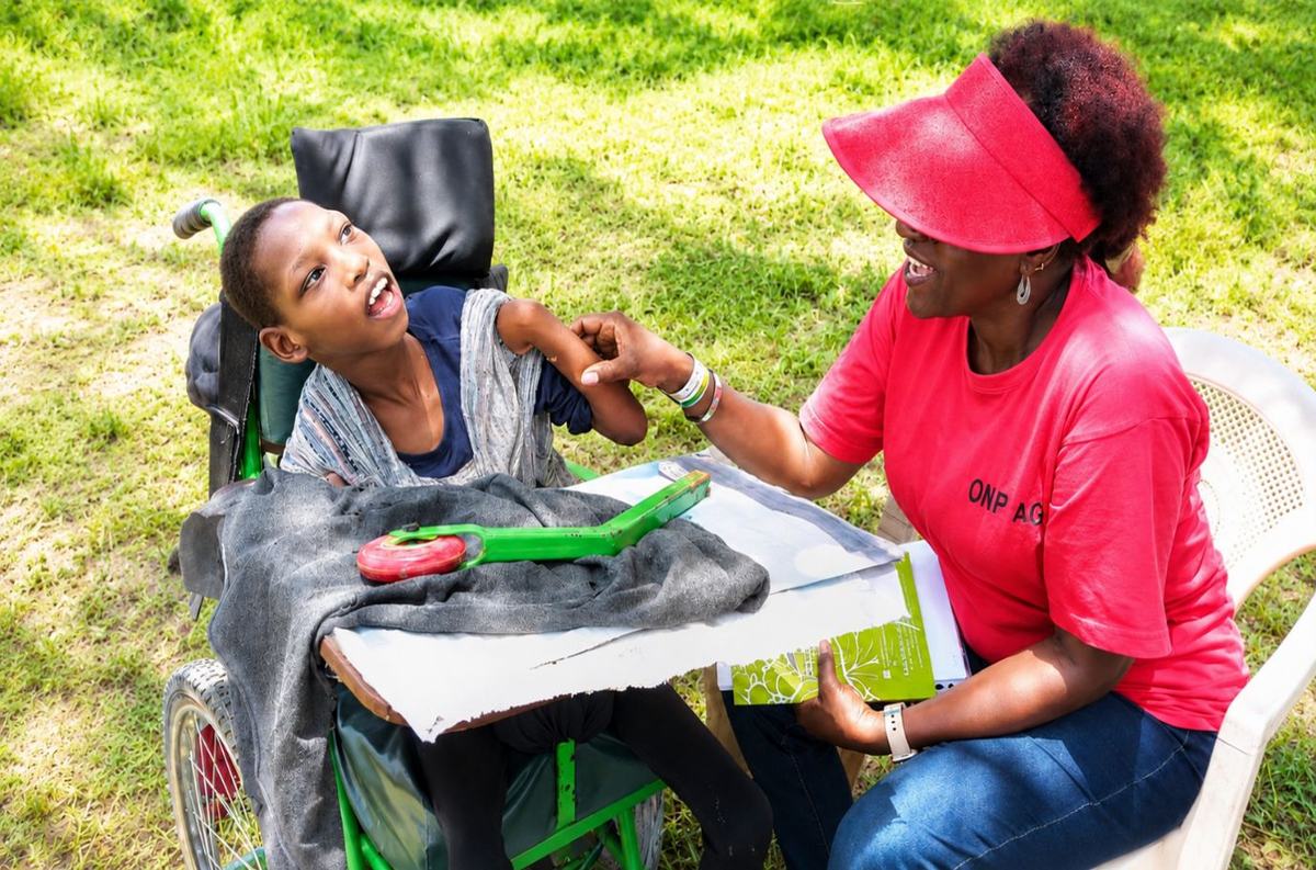 A mother joins community efforts to raise awareness and support families caring for children.